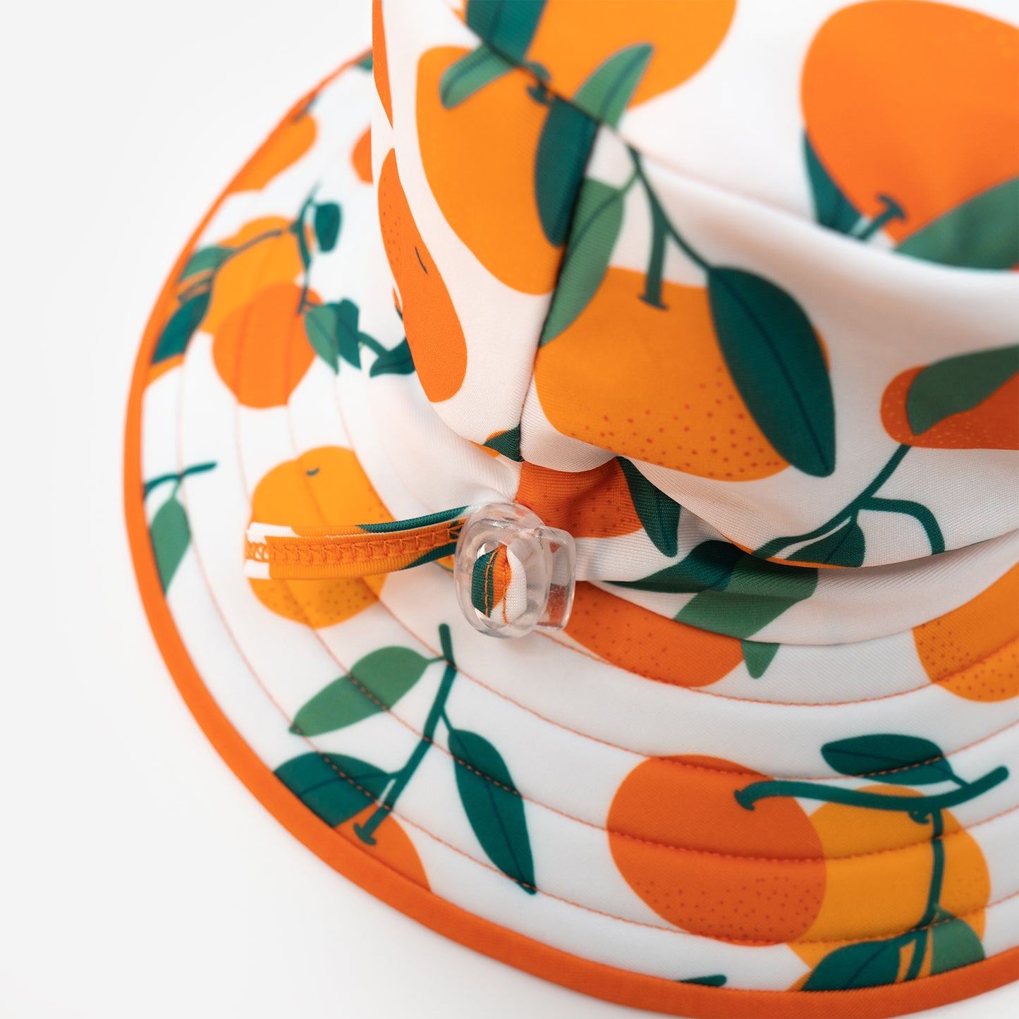 head toggle of Pipi Swimwear citrus fruit pattern reversible wide brim swim hat